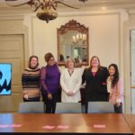 Women taking a group photo in the Wize Women Empowerment Event